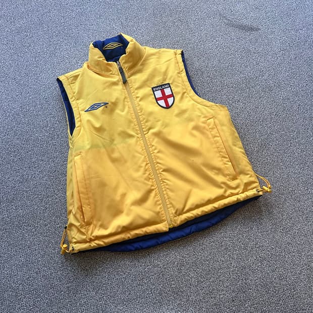 엄브로 옐로우 패딩 조끼 양면