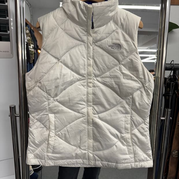 노스페이스 여성 흰/파 패딩조끼(오염)