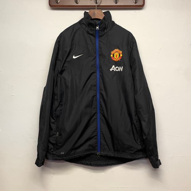 나이키 (우먼) 맨유 Aon 블랙 바람막이 자켓
