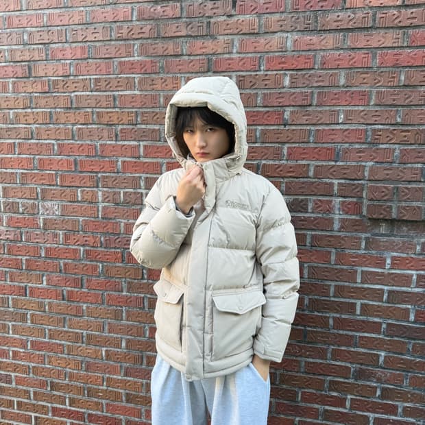 디스커버리 아이보리 패딩