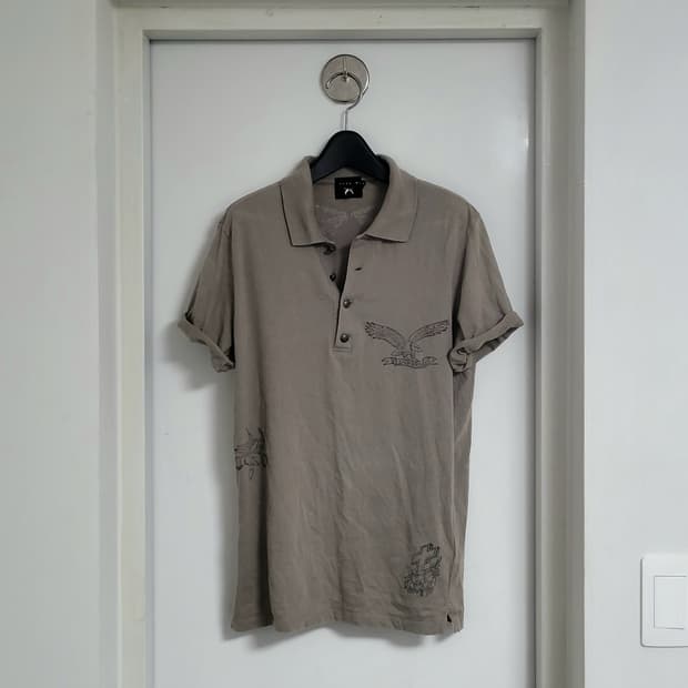 Roarguns tatooed skin polo