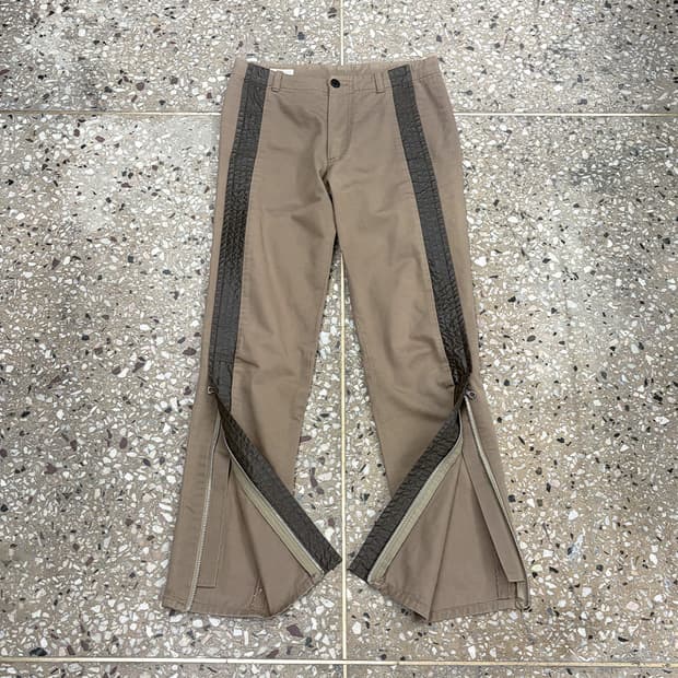 드리스 반 노튼 파이핑 디테일 지퍼 팬츠