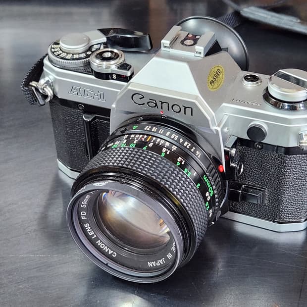 (미사용) 캐논 AE-1 + FD 50mm f1.4 필름 카메라