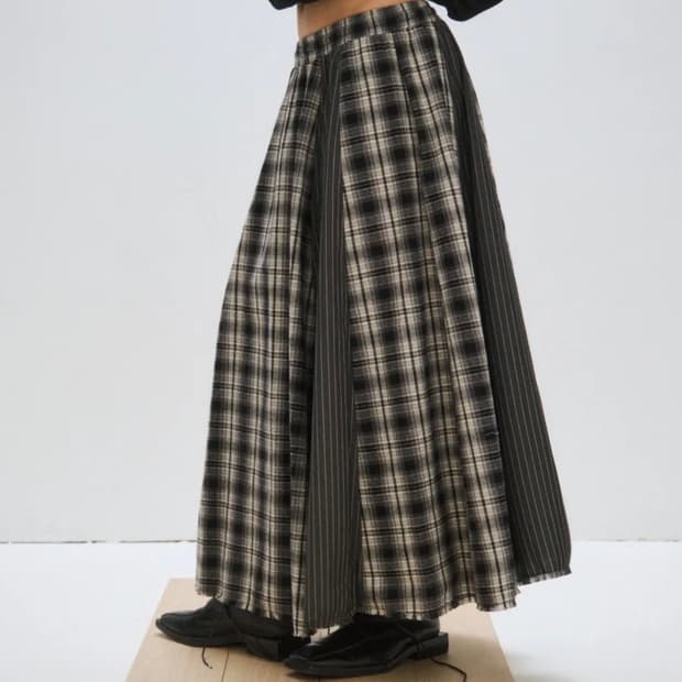 플리즈프로젝트 오버 체크 맥시 스커트 블랙