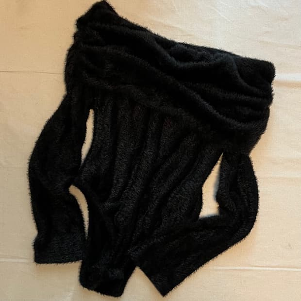 black off-shoulder fur bodysuit