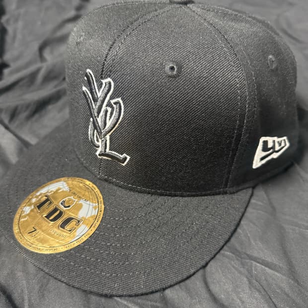 YVL HAT 7 1/2 White trim On Black