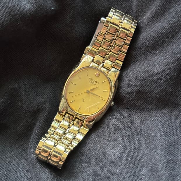 vintage cygma metal watch