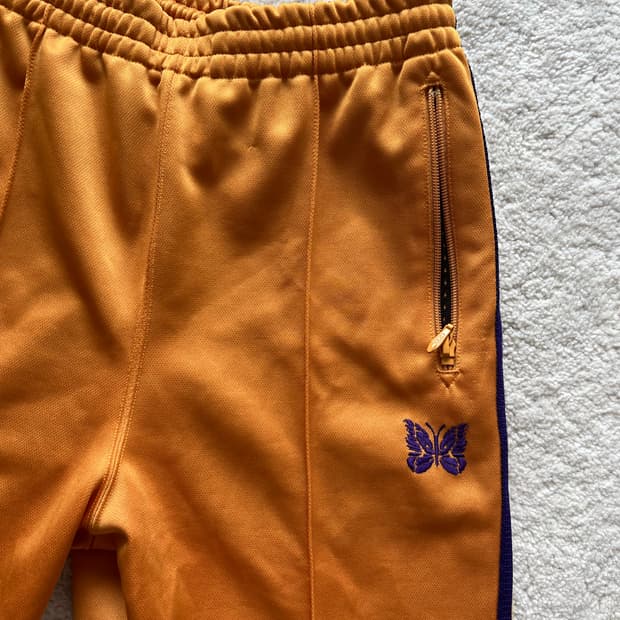 니들스 트랙팬츠 옐로우 골드