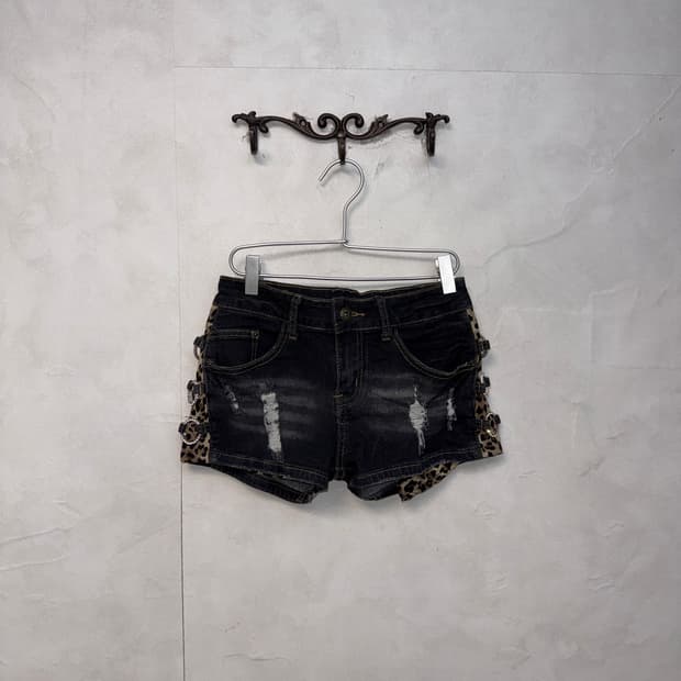 Destroyed denim leopard ring shorts