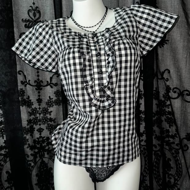 black checkered blouse