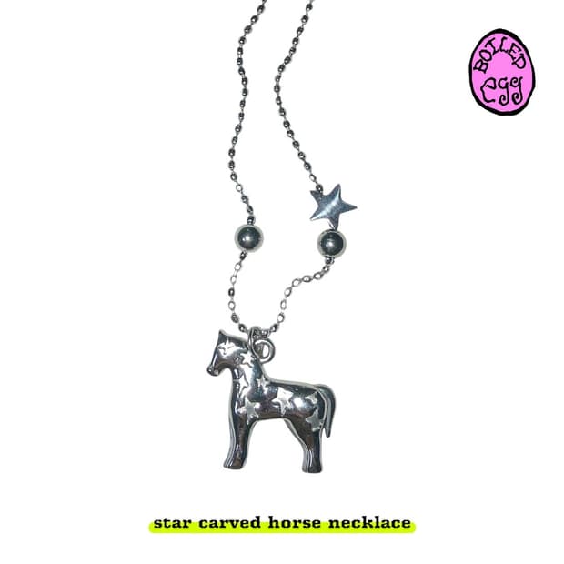 star carved horse necklace