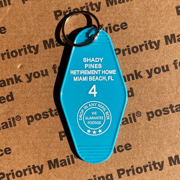 90s vtg Retirement Home Motel Keyring