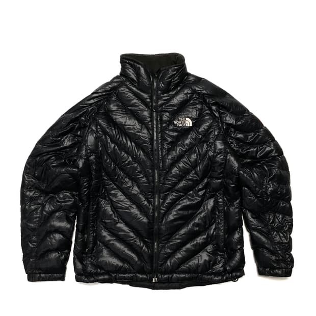 노스페이스 퍼택스 미드로고 경량패딩 