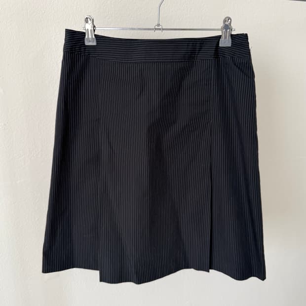 콤사이즘 미디 스커트