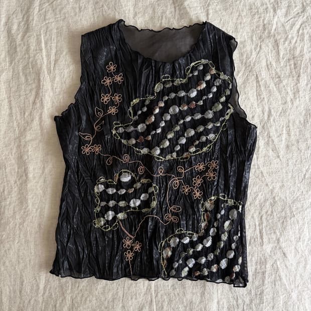 sheer patterned sleeveless top