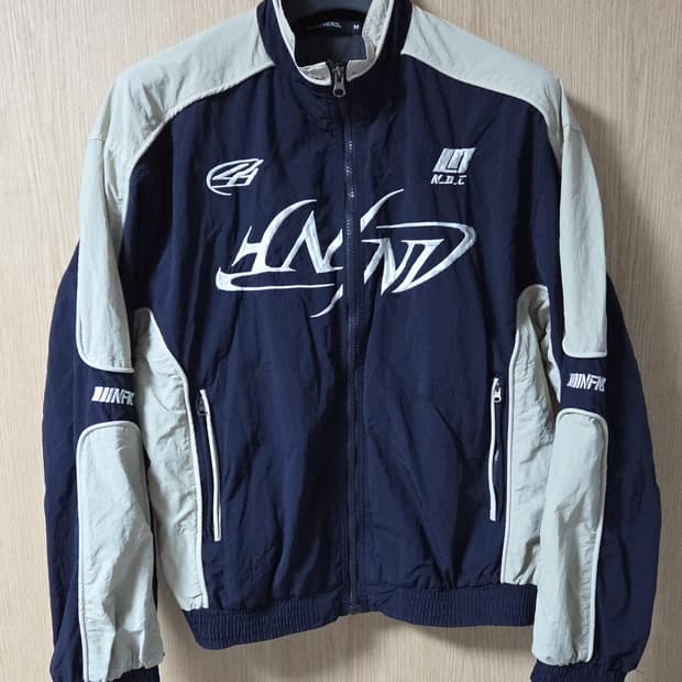 낫포너드 레이싱 우븐 바람막이 자켓