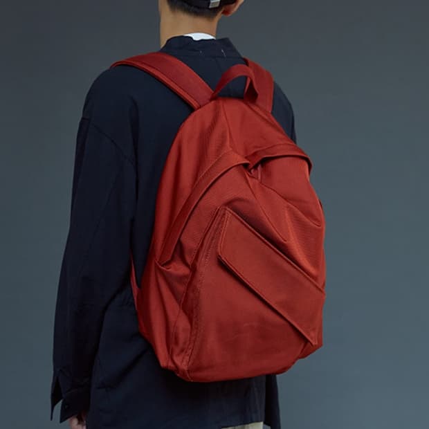 이스트팩 x 라프시몬스 백팩