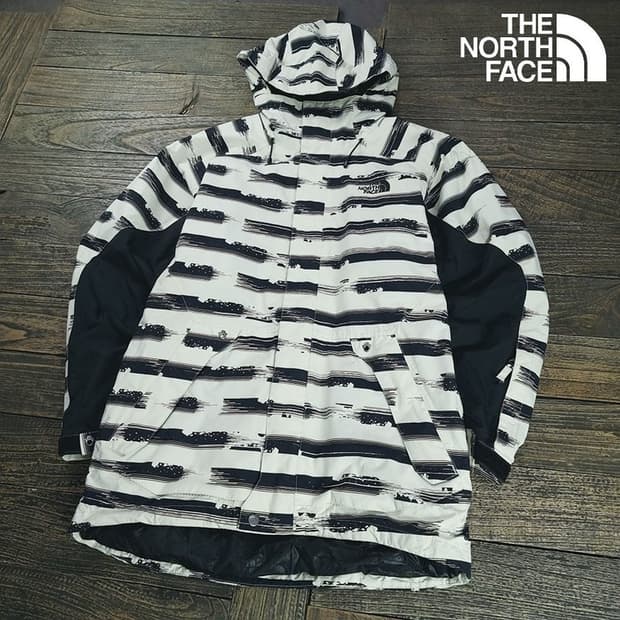 [노스페이스] 그래픽 패턴 오버핏 바람막이 보드 자켓 M19059
