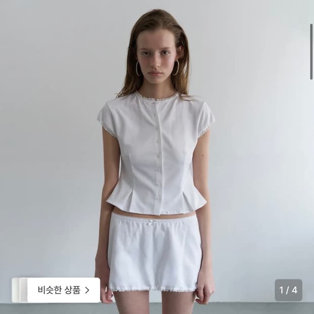 오버듀플레어 레이스 페플럼 코튼 블라우스