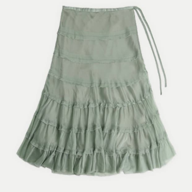 콜로신스 NORA SHIMMERING SKIRT GLOSSY MINT