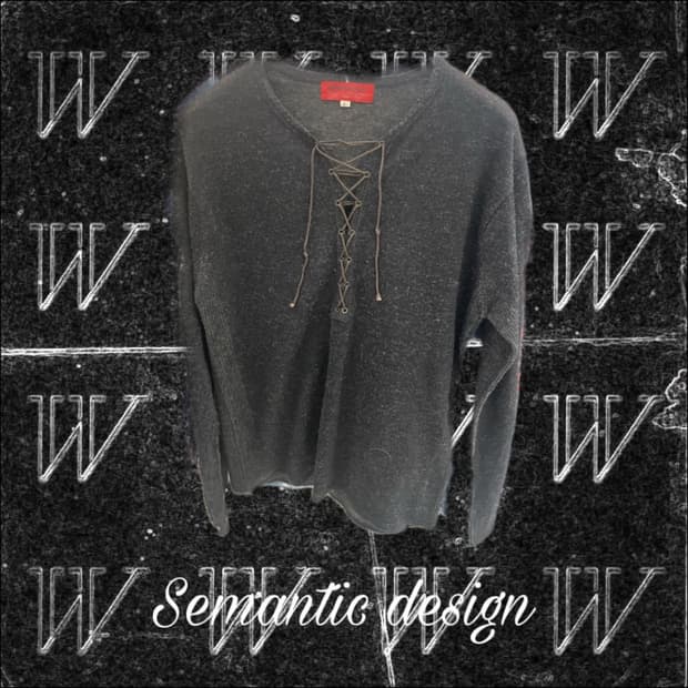 Semantic Design lace up sweater