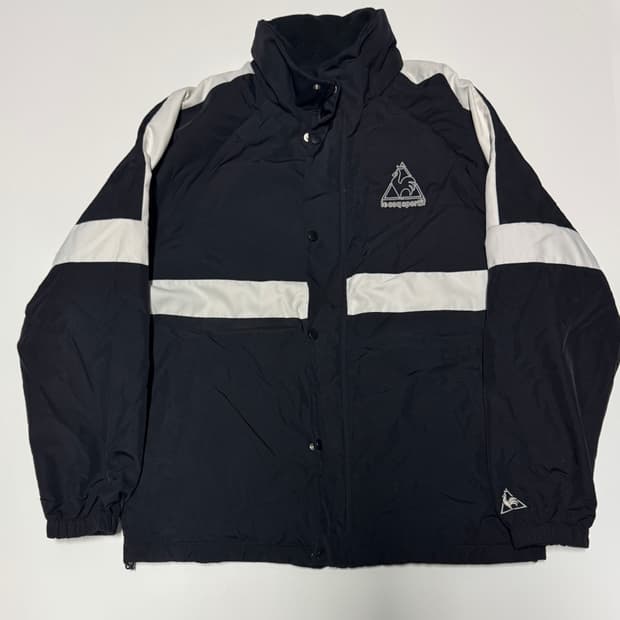 르꼬끄 스포르티브 오버핏 양면 바람막이 후리스 자켓