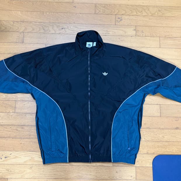 아디다스 리카이브 우븐 트랙탑