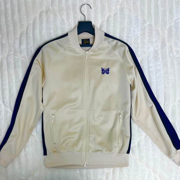 니들스 트랙자켓 별주 모델