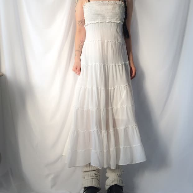 White sleeveless one piece
