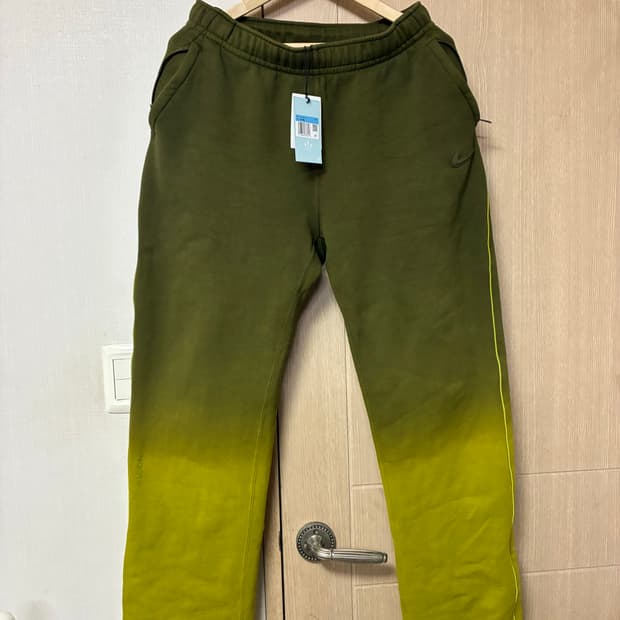 [M]나이키x녹타 NRG 플리스 팬츠 오버 헴 미디엄 올리브