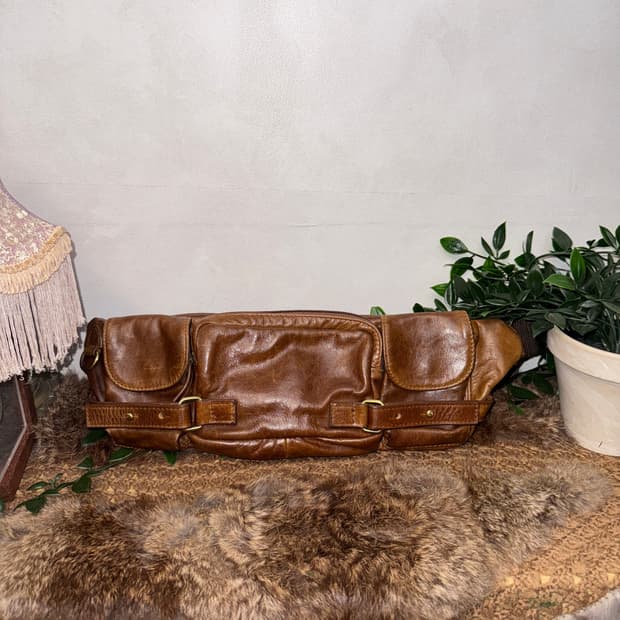 Aging brown multi pocket belt bag
