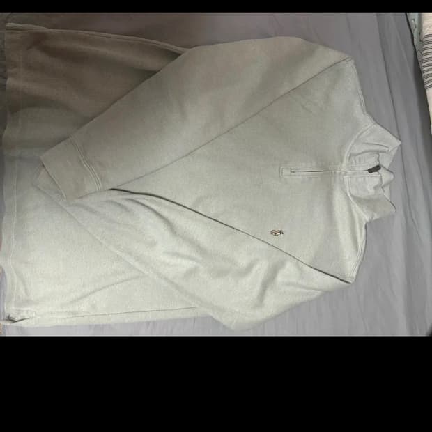 폴로 반집업 니트