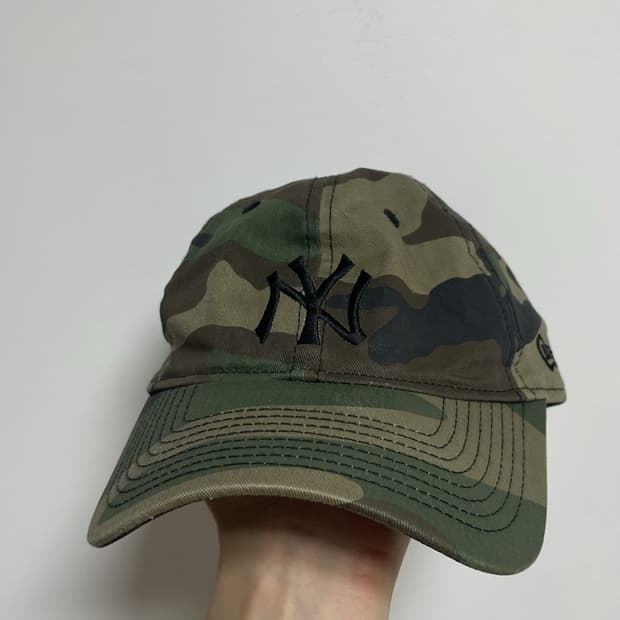 디스이즈네버댓X뉴에라 카모 볼캡