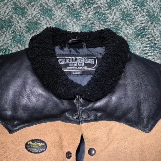 챌린저 가죽다운 베스트