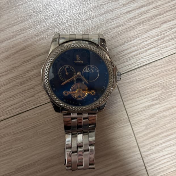 오토매틱 메탈 시계 오픈워크 디자인