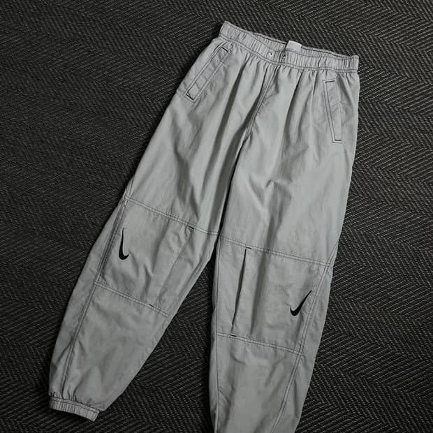나이키 리펠 스우시 자수 나일론 트랙 조거 팬츠 y 4270