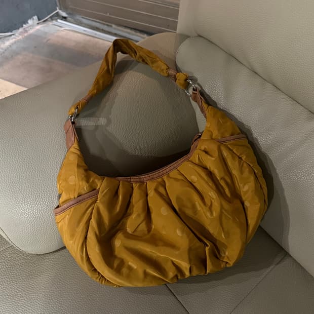 Mustard dot pattern padding shoulder bag