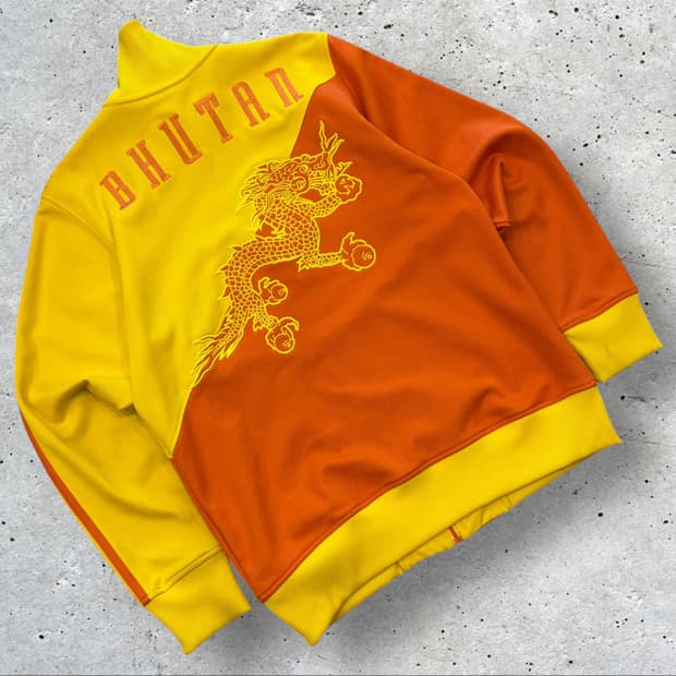 [100] 07s 아디다스 부탄 드래곤 자켓 옐로우/오렌지 C804