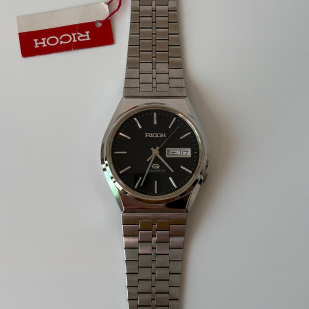 1980s Black Dial Silver Riquartz