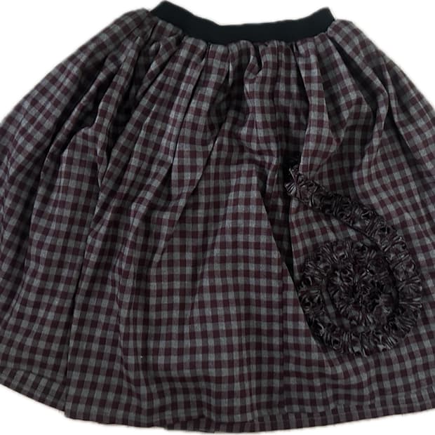 더뮤비엄비지터 치마