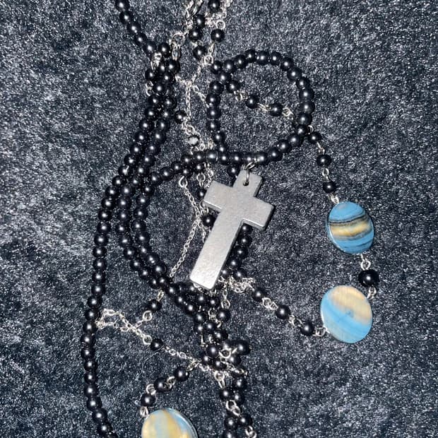 The cross necklace