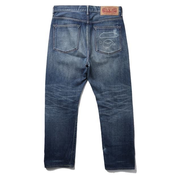 A BATHING APE Ape Head Print Denim Pants