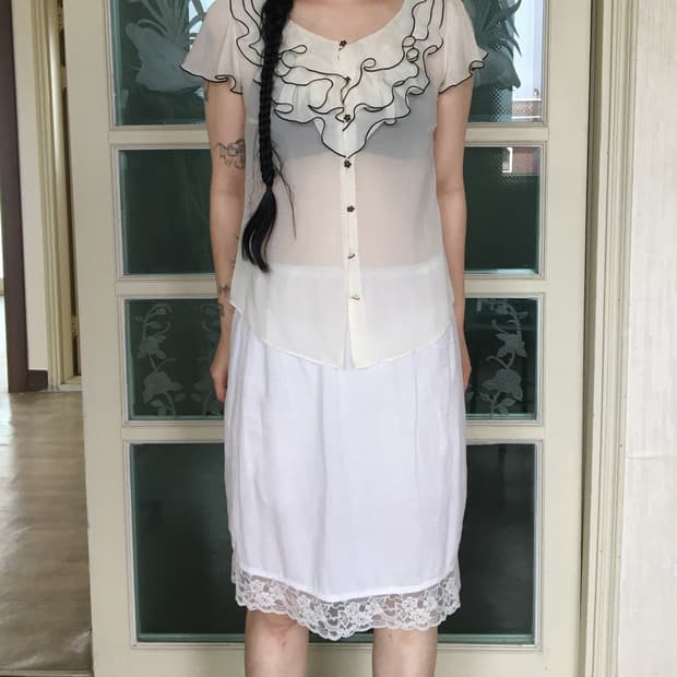 Ruffle point see through blouse