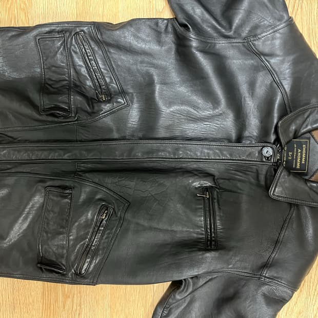 D'HOMME A HOMME의 양가죽 블랙 카코트