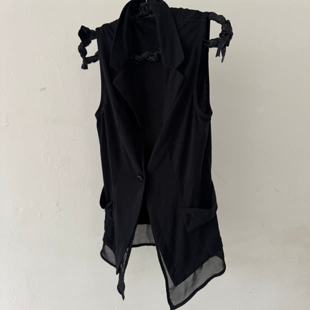 Draped sleeveless vest