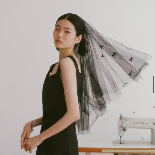 가니송 베일, 코사지