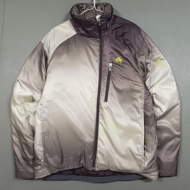 100) 나이키 ACG 어시메트릭 사선 지퍼 아카이브 패딩 자켓