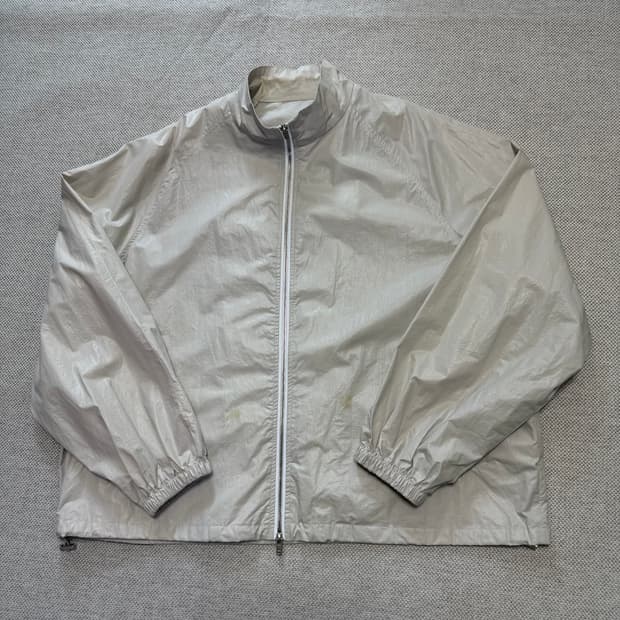 마땡킴 빅로고 코팅 바람막이 자켓