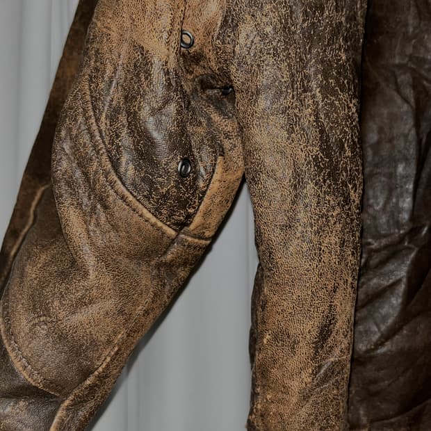 90s distressed brown leather jacket