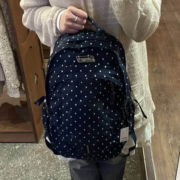 콜맨 빈티지 도트 백팩 네이비